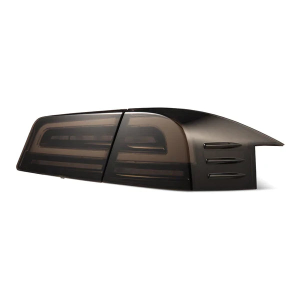 AlphaRex 12-21 Tesla Model S LUXX-Series LED Tail Lights Black Smoke (With Black Trunk Center Piece Replacement)
