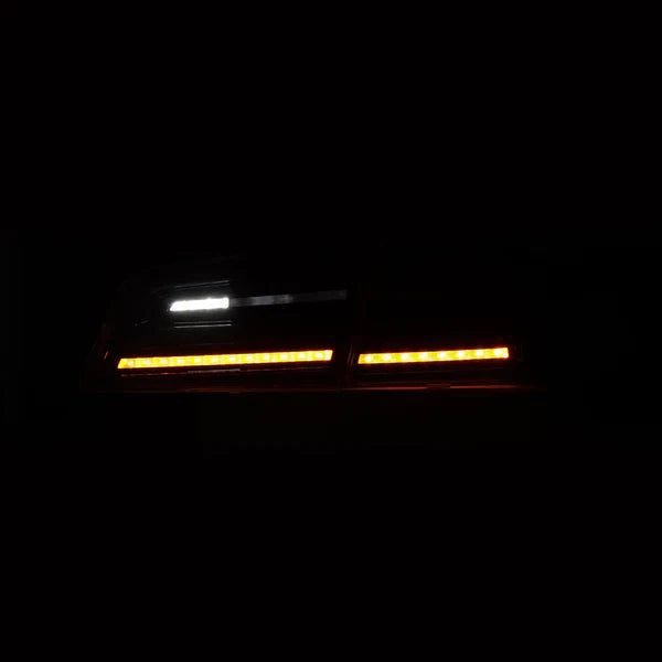 AlphaRex 12-21 Tesla Model S LUXX-Series LED Tail Lights Black Smoke (With Black Trunk Center Piece Replacement)