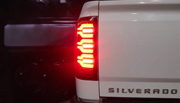 AlphaRex 14-18 Chevrolet Silverado 1500 / 15-19 Silverado 2500HD/3500HD / 15-19 GMC Sierra 3500HD Dually LUXX-Series LED Tail Lights Black