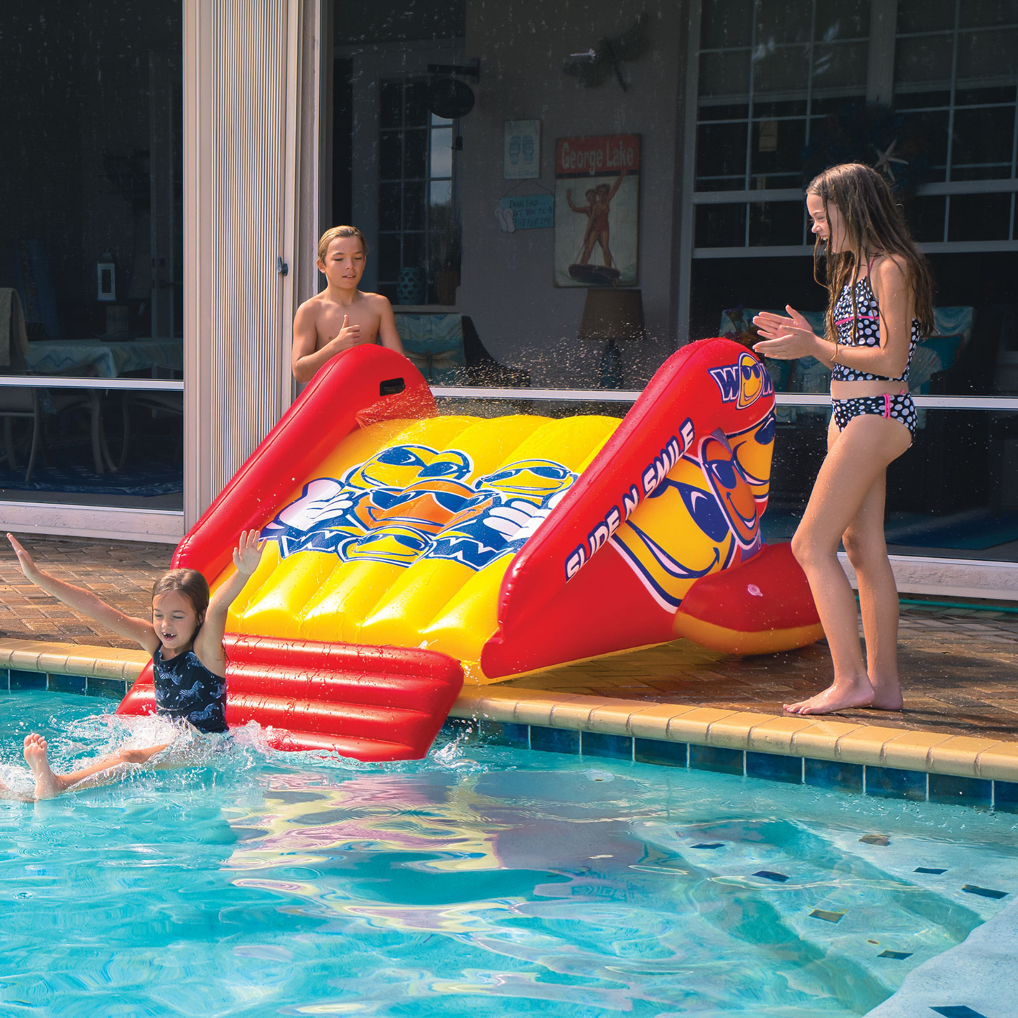 WOW Sports Slide N Smile Inflatable Pool Slide with Sprinklers for Kids and Adults