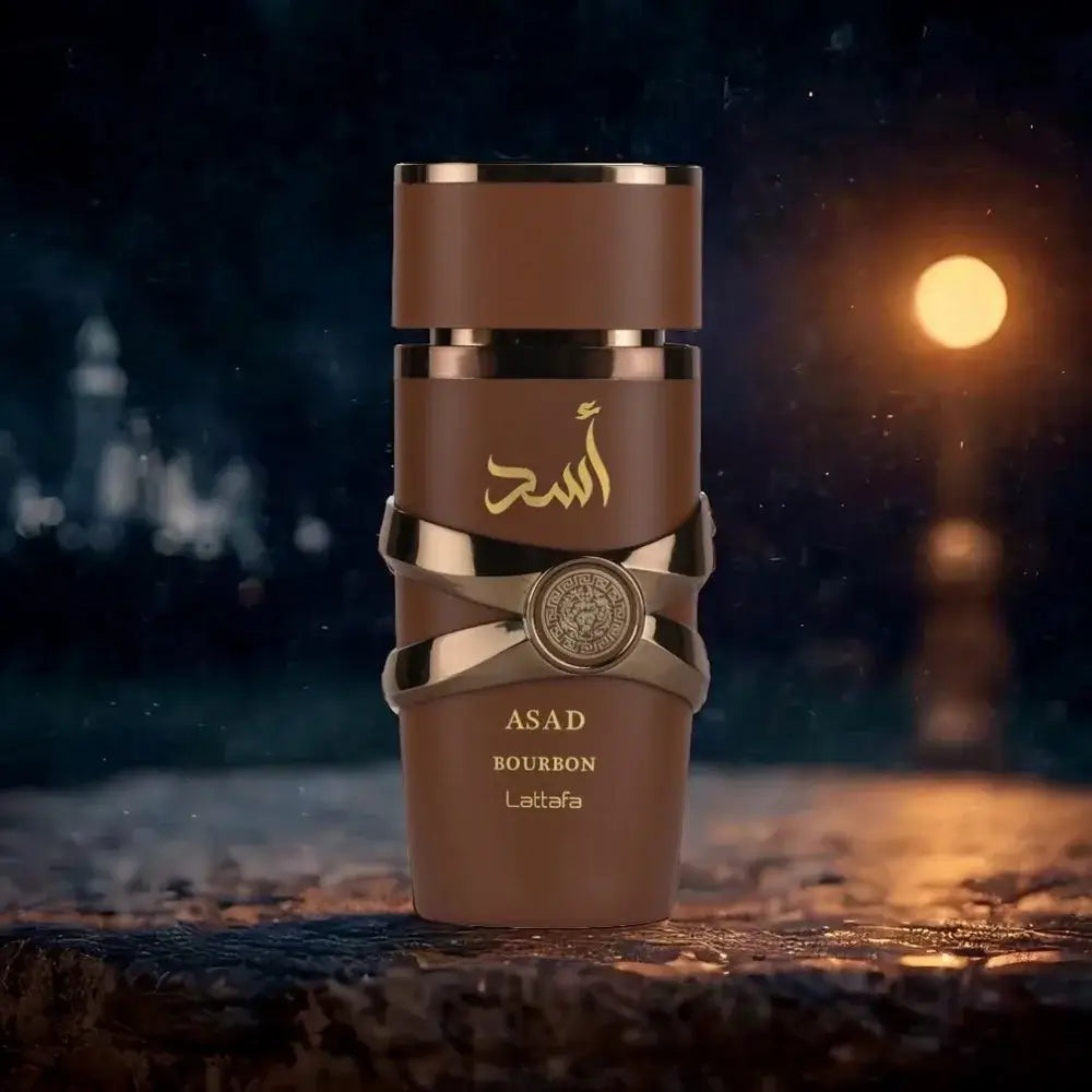 Lattafa Asad Bourbon Eau De Parfum Spray 100ml unisex fragrance in a stylish bottle with elegant packaging.