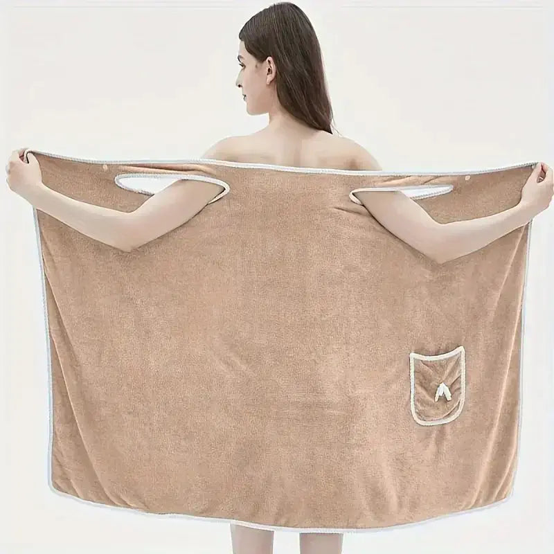 Adult wearing a bowknot coral velvet bath towel, showcases its oversized design and quick-drying material.