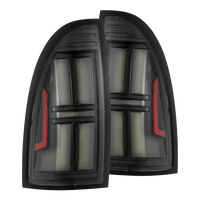 AlphaRex 05-15 Toyota Tacoma NOVA-Series Prismatic LED Tail Lights Black OffRoadUSA.com