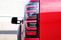 AlphaRex 07-13 Toyota Tundra LUXX-Series LED Tail Lights Black-Red OffRoadUSA.com