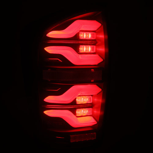AlphaRex 16-23 Toyota Tacoma LUXX-Series LED Tail Lights Black OffRoadUSA.com