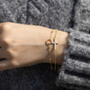 Gold Layered Cross Bracelet vanimy