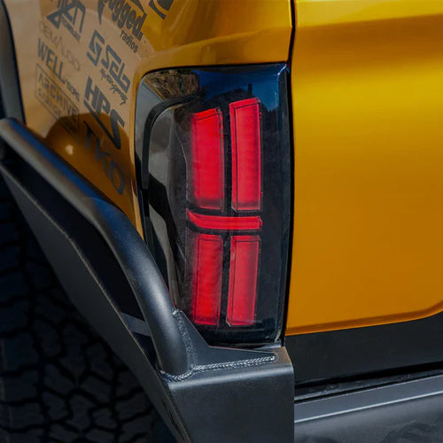 AlphaRex 16-23 Toyota Tacoma NOVA-Series Prismatic LED Tail Lights Black OffRoadUSA.com