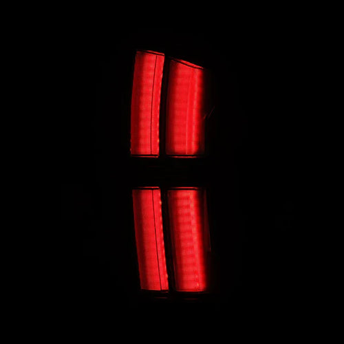 AlphaRex 16-23 Toyota Tacoma NOVA-Series Prismatic LED Tail Lights Black OffRoadUSA.com