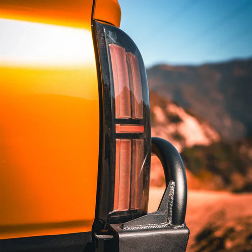 AlphaRex 16-23 Toyota Tacoma NOVA-Series Prismatic LED Tail Lights Black OffRoadUSA.com