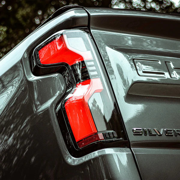 AlphaRex 19-25 Chevrolet Silverado 1500 / 20-25 Silverado 2500HD/3500HD LUXX-Series LED Tail Lights Alpha-Black