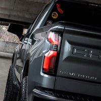 AlphaRex 19-25 Chevrolet Silverado 1500 / 20-25 Silverado 2500HD/3500HD LUXX-Series LED Tail Lights Black Red OffRoadUSA.com