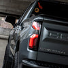 AlphaRex 19-25 Chevrolet Silverado 1500 / 20-25 Silverado 2500HD/3500HD LUXX-Series LED Tail Lights Black OffRoadUSA.com