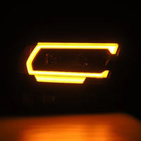 AlphaRex 19-22 Ram 1500 LUXX LED Projector Headlights Alpha Black OffRoadUSA.com