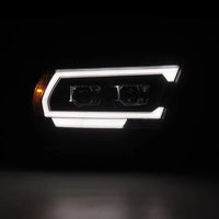 AlphaRex 19-24 Ram 1500 (MK II 2500 Style) PRO-Series Halogen Projector Headlights Black OffRoadUSA.com