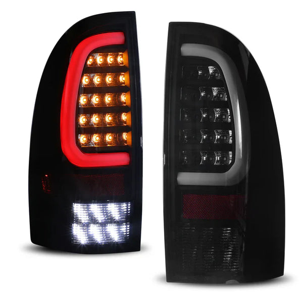 Winjet 2005-2015 Toyota Tacoma LED Sequential Tail Light w/Yellow Turn Signal - Black / Smoke OffRoadUSA.com