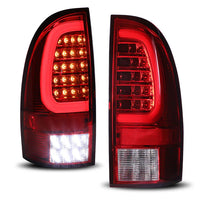 Winjet 2005-2015 Toyota Tacoma LED Tail Light w/Yellow Turn Signal Light - Chrome / Red OffRoadUSA.com