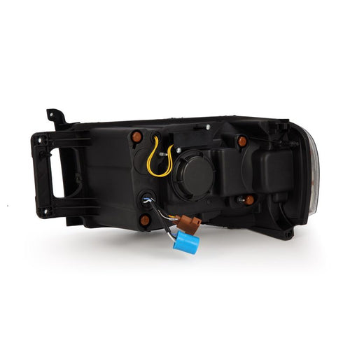 AlphaRex 02-05 Dodge Ram PRO-Series Halogen Projector Headlights Alpha-Black OffRoadUSA.com