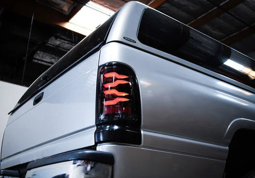 AlphaRex 94-01 Dodge Ram 1500/94-02 Ram 2500/3500 LUXX-Series LED Tail Lights Black Red OffRoadUSA.com