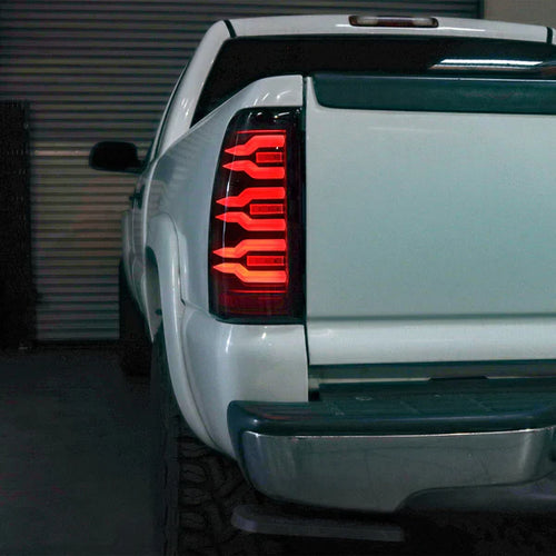 AlphaRex 99-06 Chevrolet Silverado Sierra LUXX-Series LED Tail Lights Alpha-Black OffRoadUSA.com