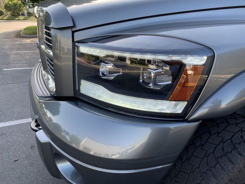 AlphaRex 06-08 Dodge Ram LUXX-Series LED Projector Headlights Alpha-Black OffRoadUSA.com