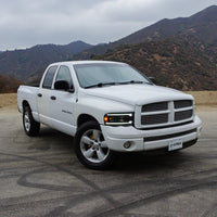 AlphaRex 02-05 Dodge Ram PRO-Series Halogen Projector Headlights Alpha-Black OffRoadUSA.com