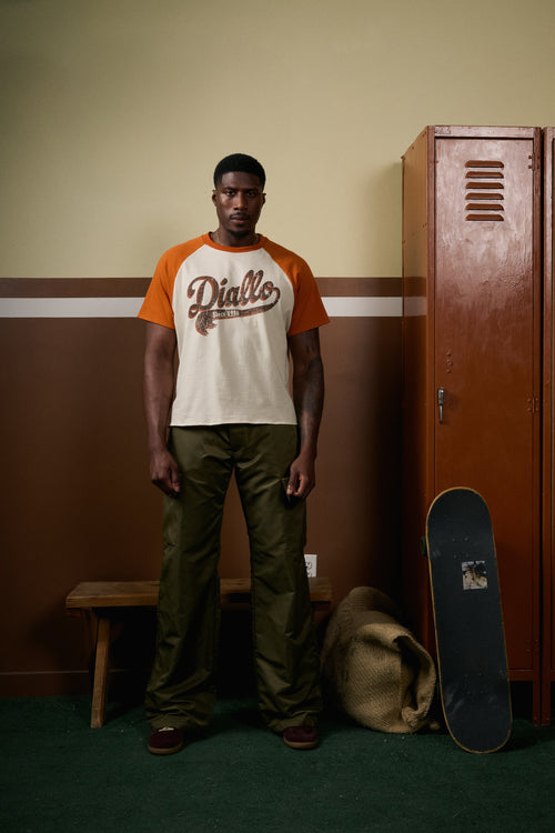 DIALLO SIGNATURE RAGLAN TEE DIALLO