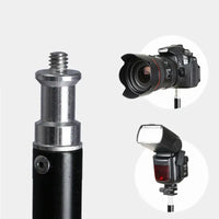 Close-up of adjustable tripod screw head compatible with camera and flash equipment for photography.