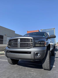 AlphaRex 06-08 Dodge Ram PRO-Series Halogen Projector Headlights Alpha-Black OffRoadUSA.com