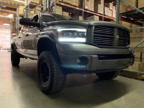 AlphaRex 06-08 Dodge Ram PRO-Series Halogen Projector Headlights Alpha-Black OffRoadUSA.com
