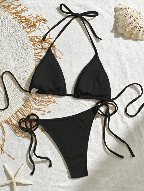 Enigmatic Black with Exquisite Lace, A Seductive Gem Among Bikinis, The Beach's Center of Attention.