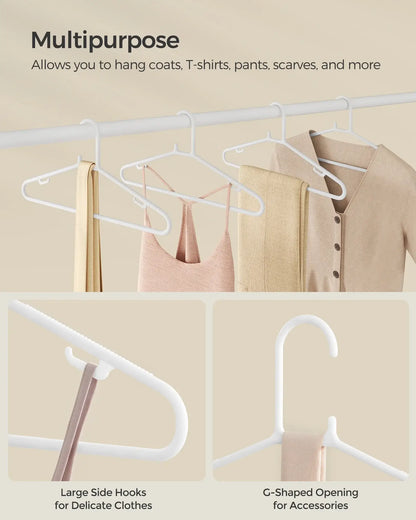 Multipurpose SONGMICS plastic hangers for coats, T-shirts, pants, and scarves with large side hooks and G-shaped opening.