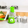 Manual rotary vegetable slicer with stainless steel drums for efficient grating and chopping in the kitchen.