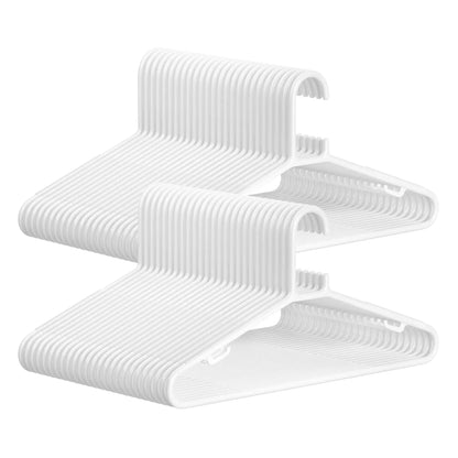 SONGMICS white plastic hangers, 50 pack, lightweight and space-saving design for clothes organization.