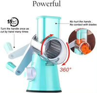 Manual rotary vegetable slicer with stainless steel drums, designed for safe and quick vegetable grating in the kitchen.