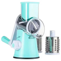 Manual rotary vegetable slicer with stainless steel drums, eco-friendly kitchen gadget for slicing and grating.