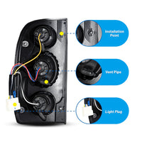 Winjet 2001-2004 Toyota Tacoma Altezza Tail Light - Black/Clear OffRoadUSA.com