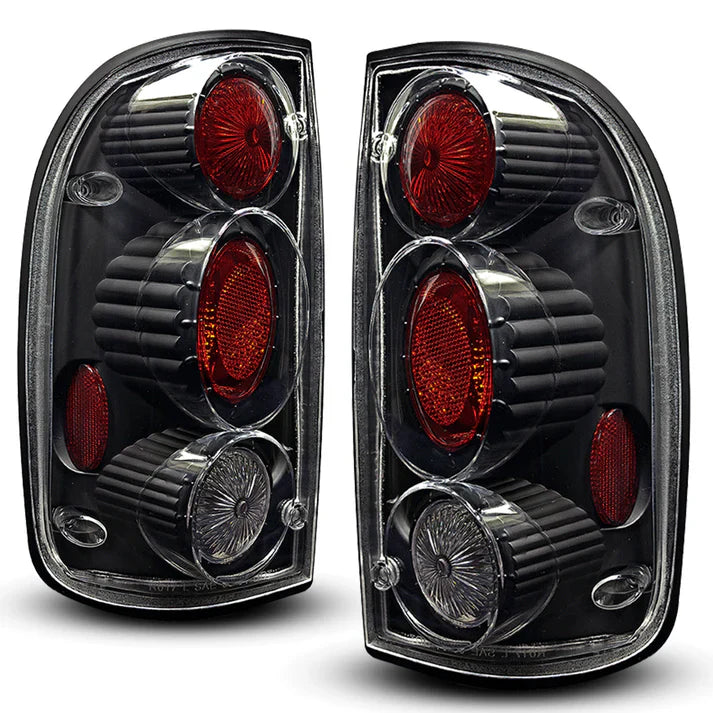 Winjet 2001-2004 Toyota Tacoma Altezza Tail Light - Black/Clear