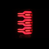 AlphaRex 14-18 GMC Sierra 1500/2500HD/3500HD LUXX-Series LED Tail Lights Blk/Red w/Actv Lgt Seq. Sig OffRoadUSA.com