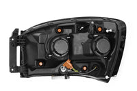 AlphaRex 06-08 Dodge Ram PRO-Series Halogen Projector Headlights Black OffRoadUSA.com