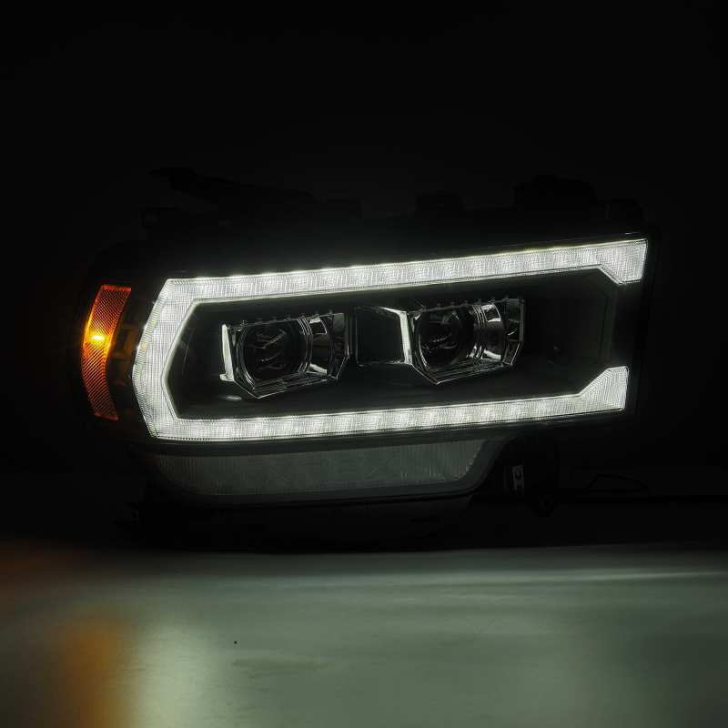 AlphaRex 19-24 Ram 2500/3500/4500/5500 PRO-Series Halogen Projector Headlights Black