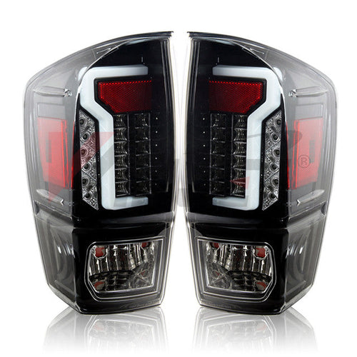 Winjet 2016-23 Toyota Tacoma LED Tail light - Glossy Black / Clear OffRoadUSA.com